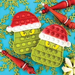 Dr. Seuss™ Grinch Pop ‘n’ Toys - 12 per bag